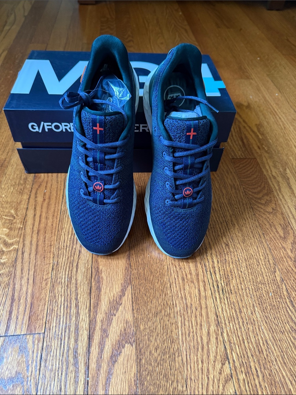 Limited edition G/FORE Men's Navy Knit Athletic Sneakers with Orange Accents